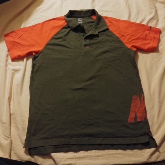 olive green and orange nike shirt